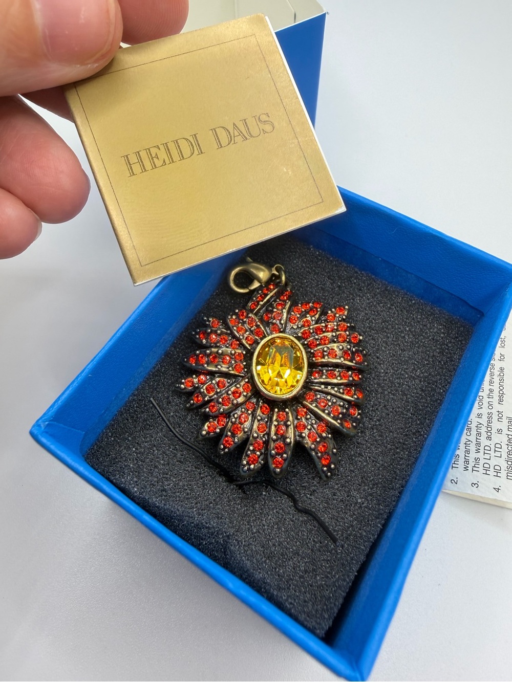 NIB Heidi Daus "Daisy" Flower charm, in gold tone metal and pave rhinestones!